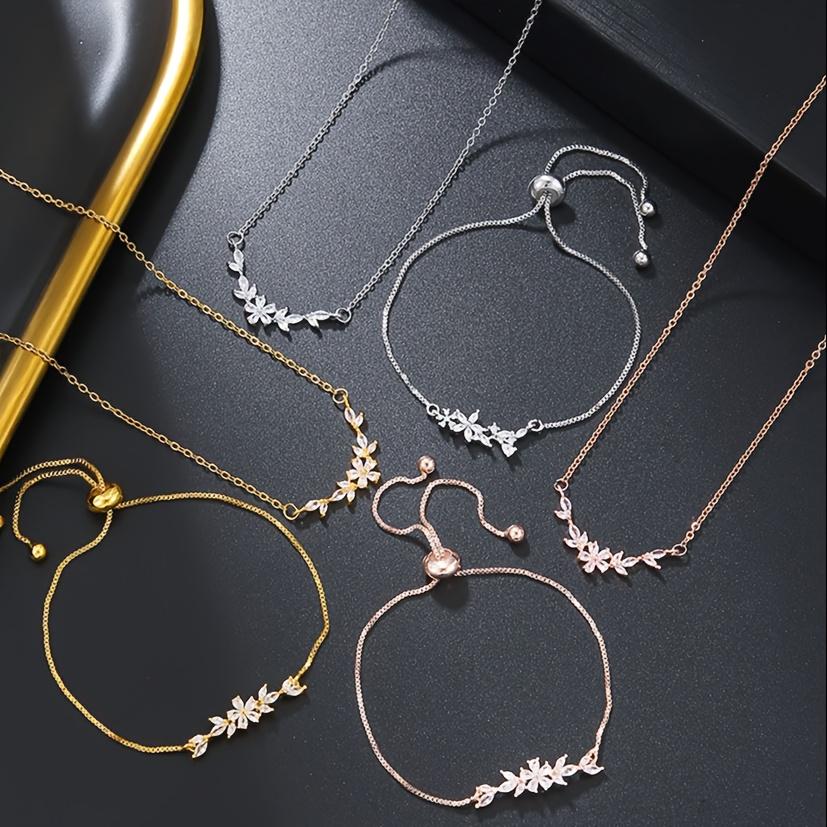 Simple and Stylish Zirconia Jewelry Set: Pendant Necklace, Adjustable Bracelet, Open Ring, and Earrings - a Perfect Holiday Gift