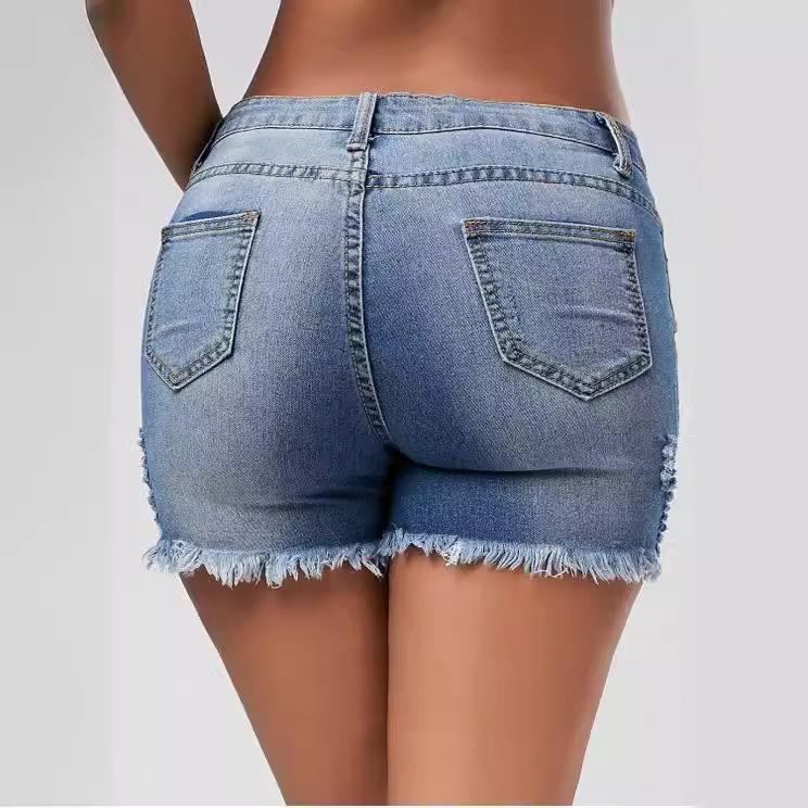 Damen-Denim-Shorts mit zerrissenen Löchern und Quasten