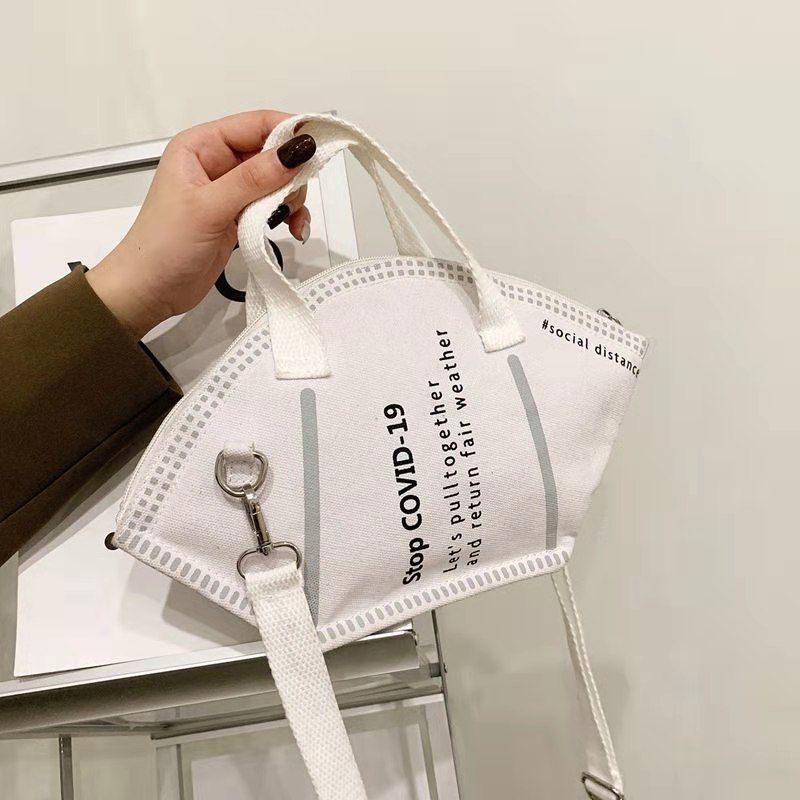 Fashionable Creative Mask Design Handbag With Spacious Capacity For Trendy Shoppers