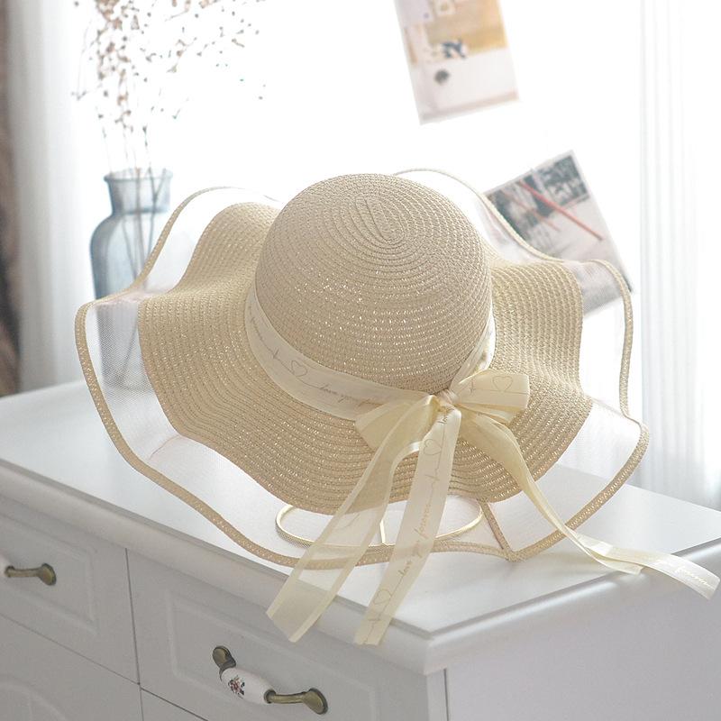 

Fresh beach big brim wavy straw hat alphabet bow streamer romantic elegant mesh sun hat