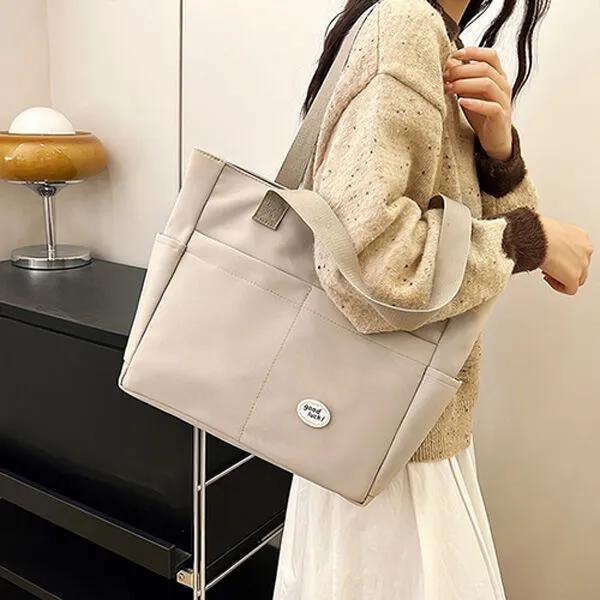 Large storage capacity daily shoulder bag for office workers, college students, and gyms