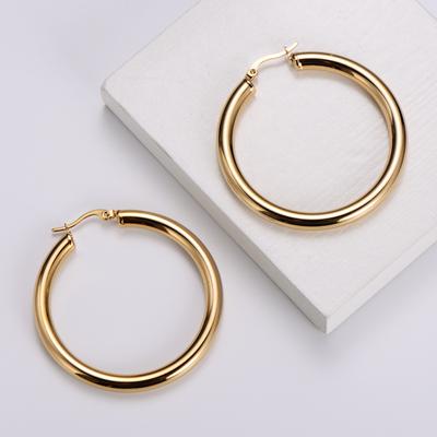 Moderner, exquisiter Edelstahl, poliert und galvanisiert, mit 18-karätigem Gold, dickem, rundem Draht und hohlem Design, großer Kreis-Ohrring.