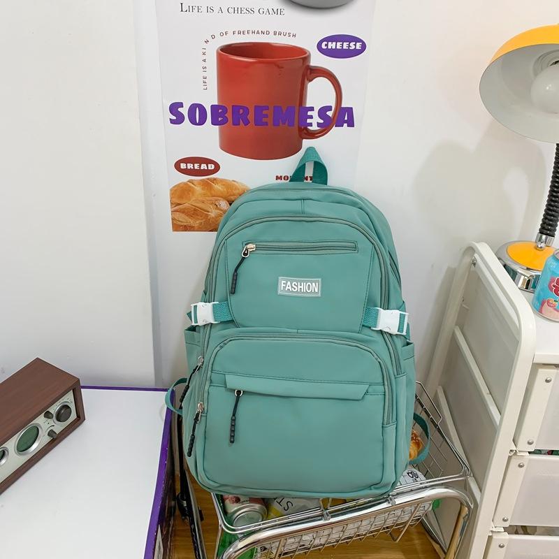 Schoolbag wholesale Korean version of casual large-capacity backpack, junior high school student schoolbag, solid color multi-layer Harajuku backpack
