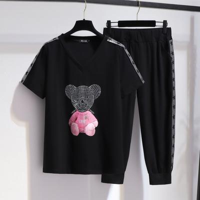 Women's Plus Size 7XL Loose Short-sleeved T-shirt + Harlan Nine-point Pants Suit