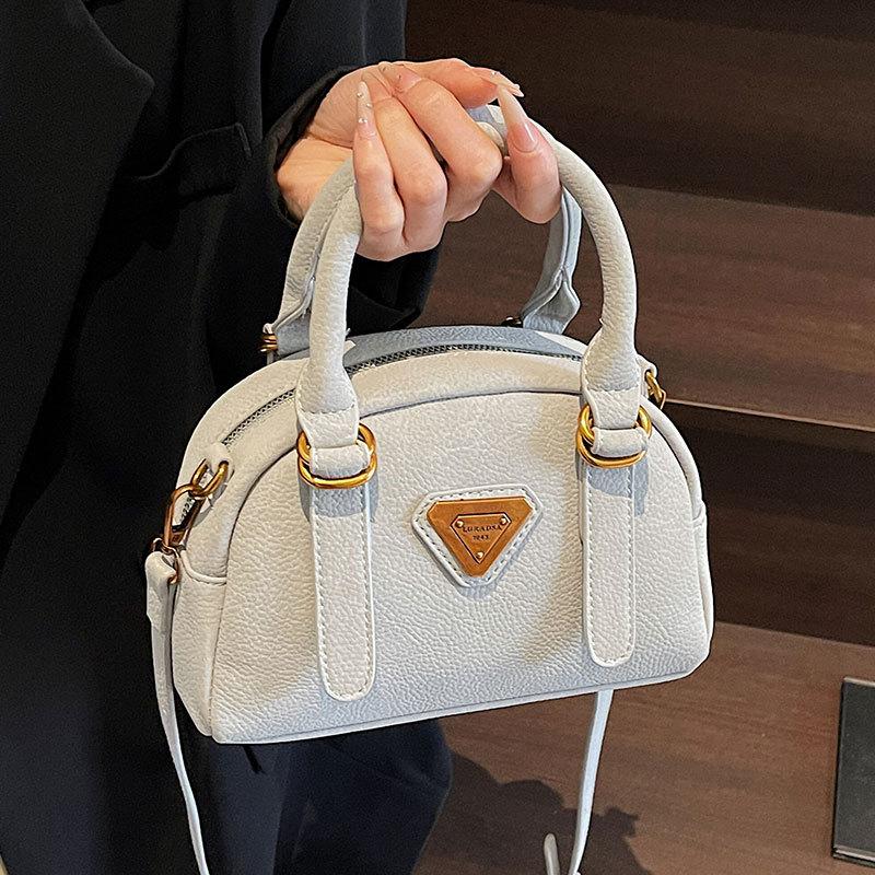 2025 Spring and Summer Hot Sale Simple Portable Boston Bag Women's High-end Sense Leisure Commuting Versatile Temperament Messenger Bag