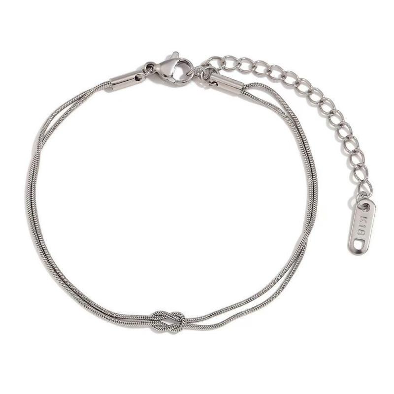 Along Island There Is A Simple Double-layer Knotted Snake Bone Chain That Both Luxurious Versatile Couples. It Comes With Plain Bracelet