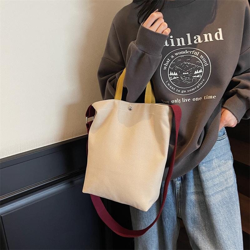 Simple canvas bag, men's and women's tide large-capacity portable shoulder bag, casual student class messenger bag