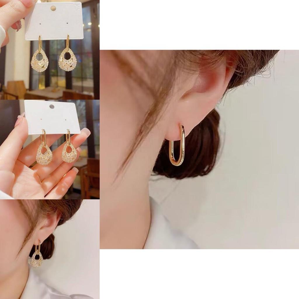 Schicke Wassertropfen-Kupferohrringe mit dicker 14-karätiger Goldplattierung und funkelndem Zirkonia