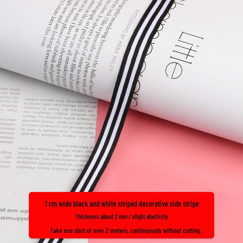 Черно-белые полосатые спортивные брюки с боковой лентой и окантовкой