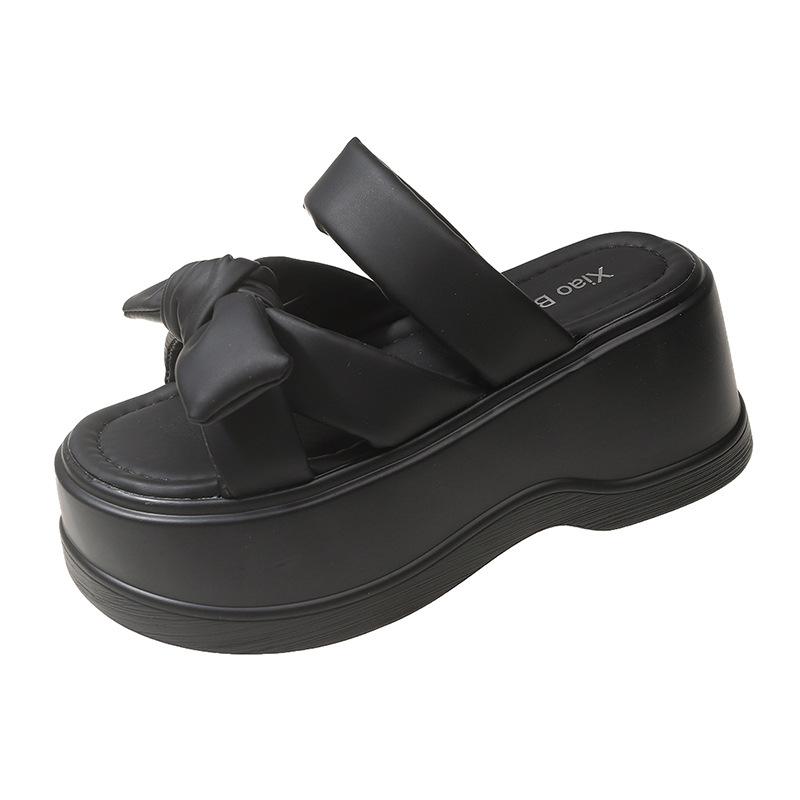 

Маленький мужчина на толстой подошве носит бант, мягкие подошвы, классные тапочки, женская летняя новая 2024 года, модная пляжная обувь в стиле феи 34 чёрный