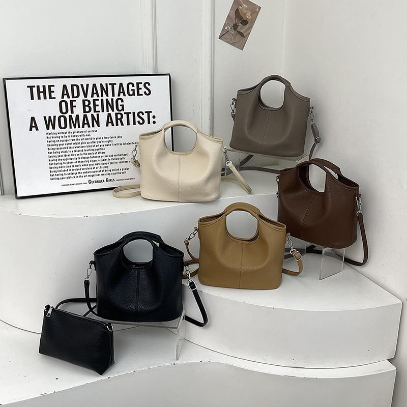 Retro work commuter bag women's large-capacity new casual versatile messenger bag women's hand-held child and mother bag