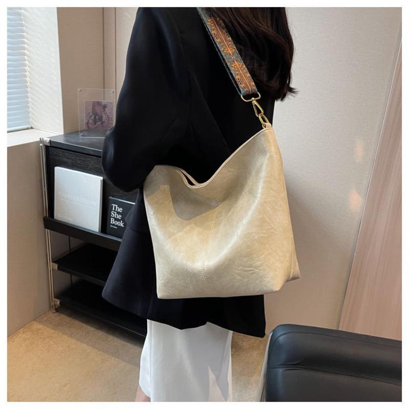 

Сумка-ведро с ручкой и плечевым ремнем абрикосовый