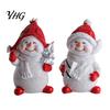 Winter Atmosphere Table Decor 2Pcs Christmas Snowman Figurine, Cute Tabletop Decor, Resin Snow Statue with Gift for Friends Knit Hat Scarf Home Mantel