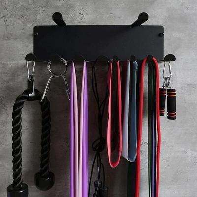 Flexible Workout Storage Rack With 8 Pegs and 2 Cylinder Holders