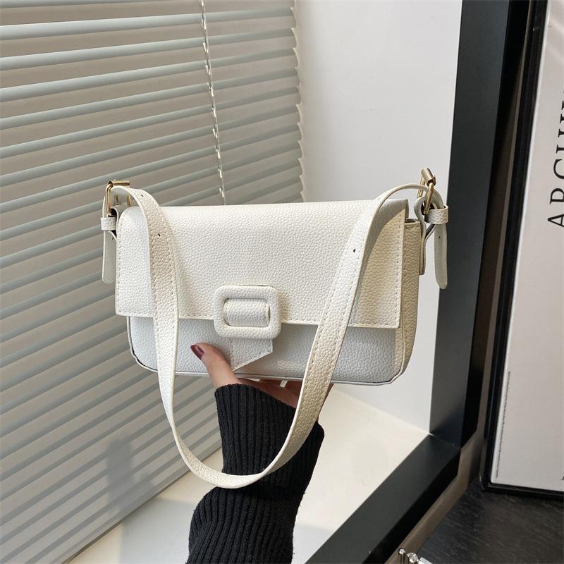 

Новые женские сумки весна-лето, универсальные и однотонные на плечо и подмышку, свежие и красивые, а сумки в руку имеют изысканную текстуру. белый