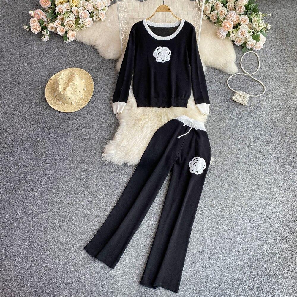 

Модный костюм женский повседневный контрастный цвет круглый вырез короткий вязаный топ + брюки с высокой талией и прямыми штанинами комплект из двух предметов One Size чёрный