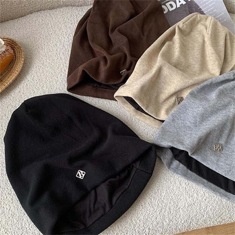 Autumn and winter Internet celebrities stacked bag head hat women's high sense metal small standard loose warm ear protection knitted hat