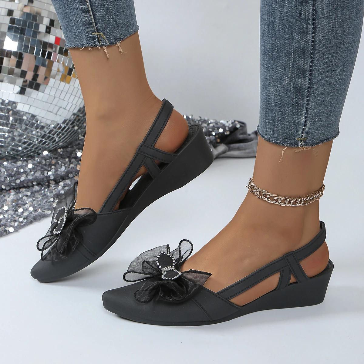 

Модная обувь бренда 2024 года для женщин, женские сандалии без застежек, модные повседневные сандалии с бабочкой, женские новые босоножки с клиновидным носком и кристаллами 40 чёрный