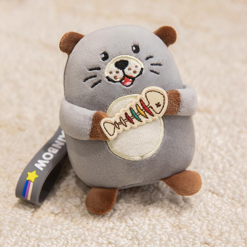 

Cartoon Otter Hugging Fish Figure Soft Gray Brown Dolls Throw Pillow Plush Toys Schoolbag Key Pendant Dolls Party Decor Present about 12cm