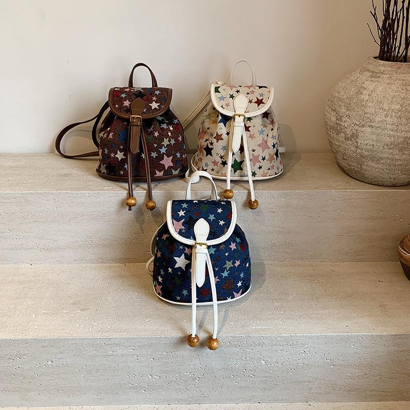 Bag 2025 new Korean version fashion printing casual commuting small schoolbag women's foreign style versatile travel backpack