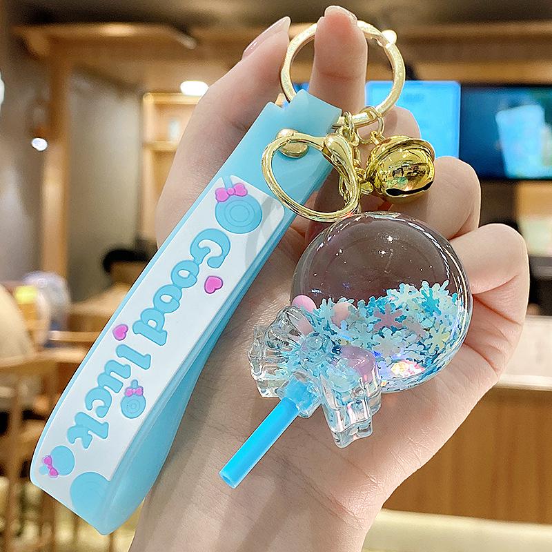 Klíčenka s ozdobou ve tvaru lízátka se sněhovými vločkami a tekutým pískem pro ženy a dívky