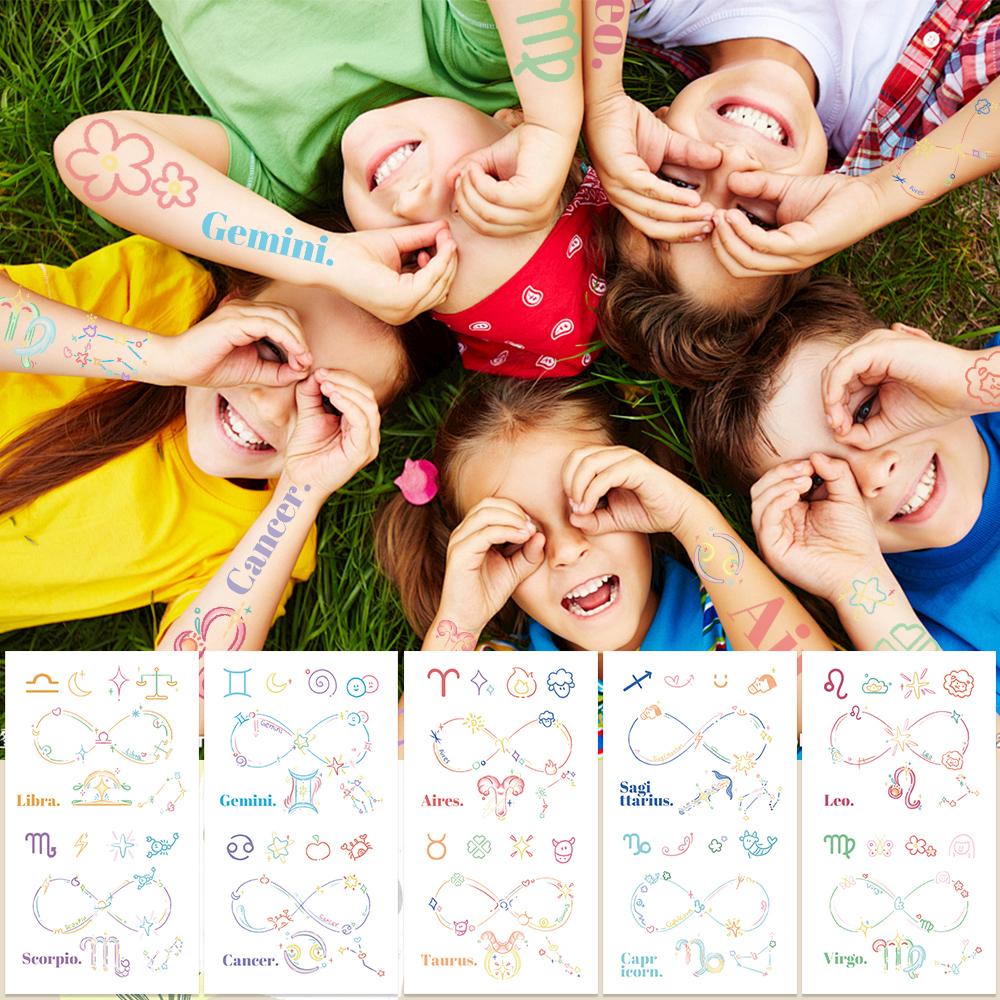 10 folhas coloridas desenhos animados constelação tatuagem adesivos para rosto braço corpo temporário à prova d'água tatuagem adesivos presentes criativos