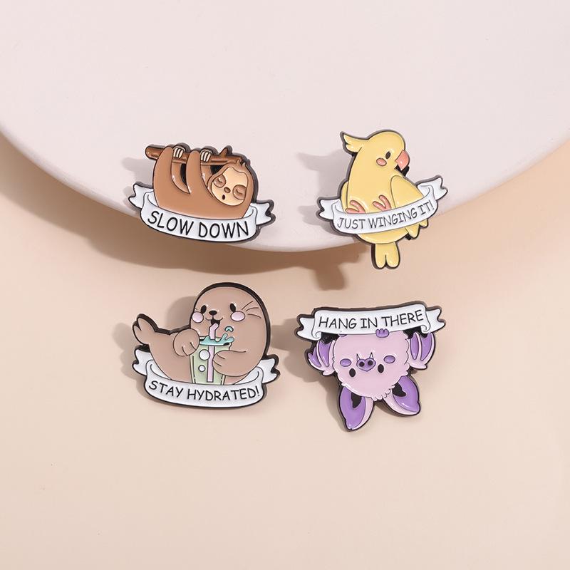 Set Broșe Adorabile Corbul Desen Animat și Puiul de Focă