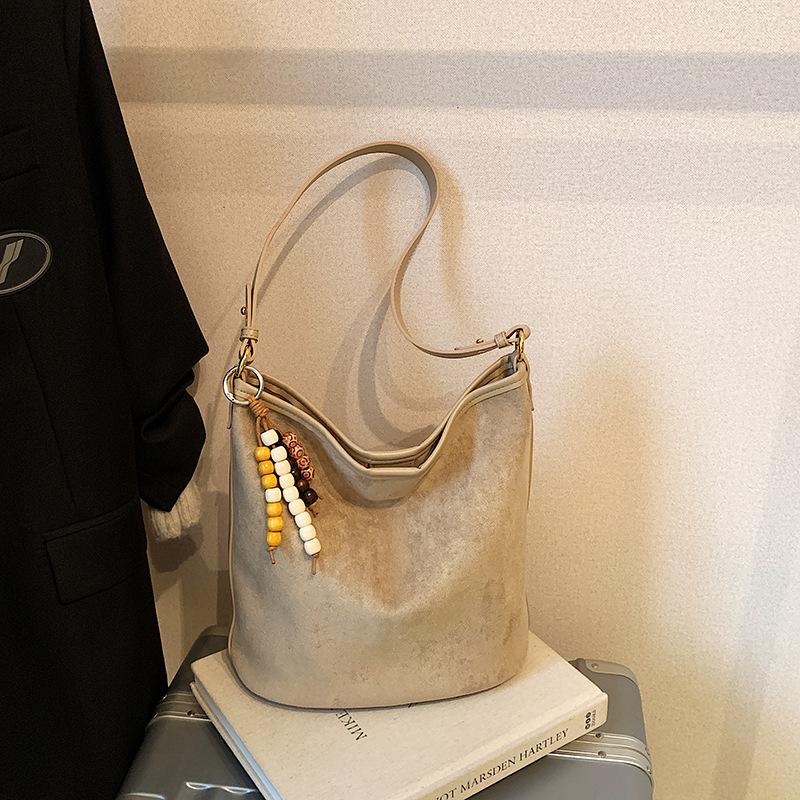 

Ретро замшевая сумка-ведро 2025 новая простая нишевая ретро сумка через плечо женская повседневная сумка для поездок single bag