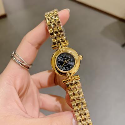 Neue Modische Damen Stahlbanduhr Temperament Zifferblatt Retro Römisch Nische Einfache Quarzuhr für Damen