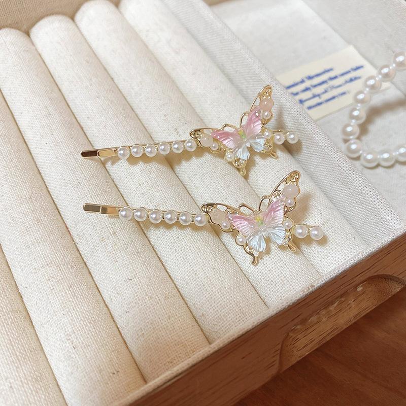 

Simple acrylic butterfly pearl hairpin women s fashion exquisite one-word clip commuting versatile headgear hair accessories high sense