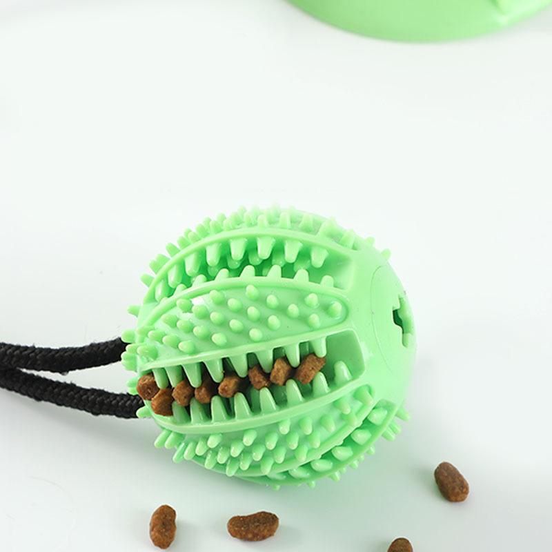 Interactive Suction Cup Dog Toy featuring Sound and Treat Dispensing - Durable Rubber Ball designed for Training and Tug-of-War Fun