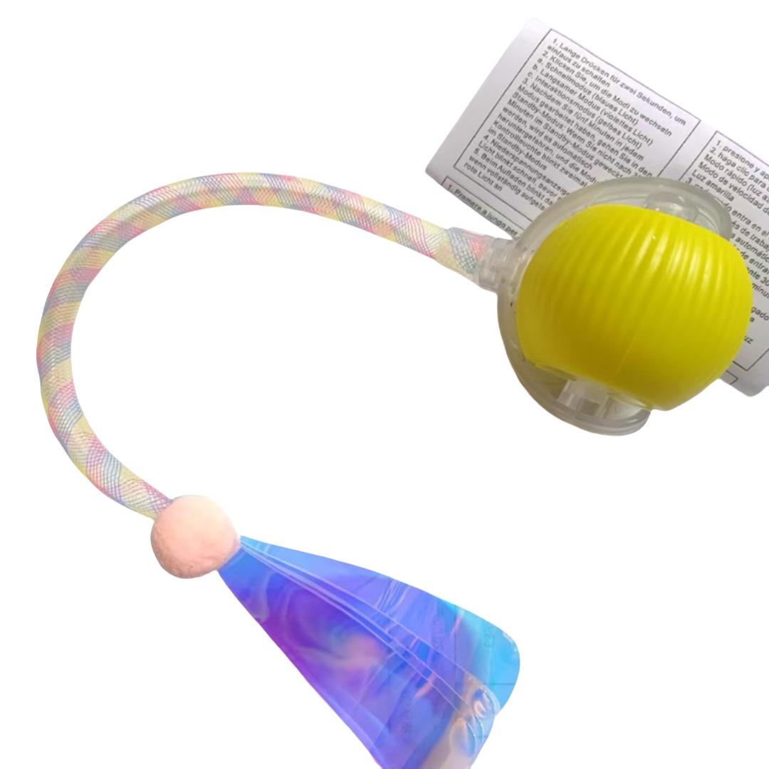 Cat interactive toy - bouncing ball with elastic net tail.