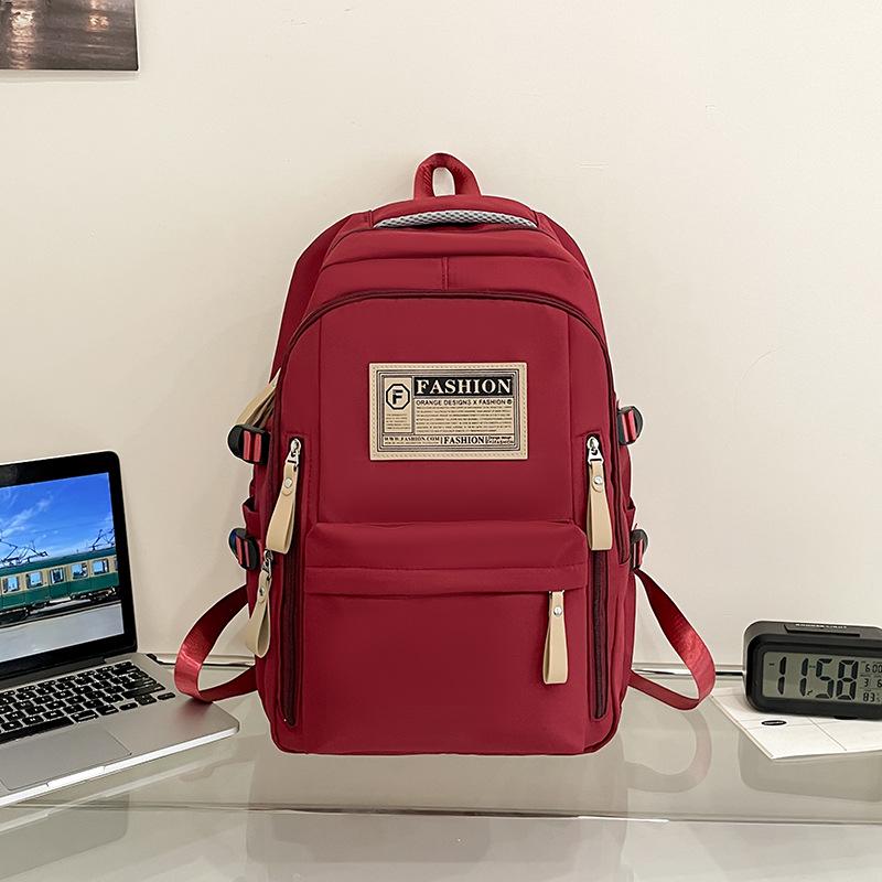 Fashionable Water-Repellent Student Backpack: Trendy High-Capacity Design for Couples