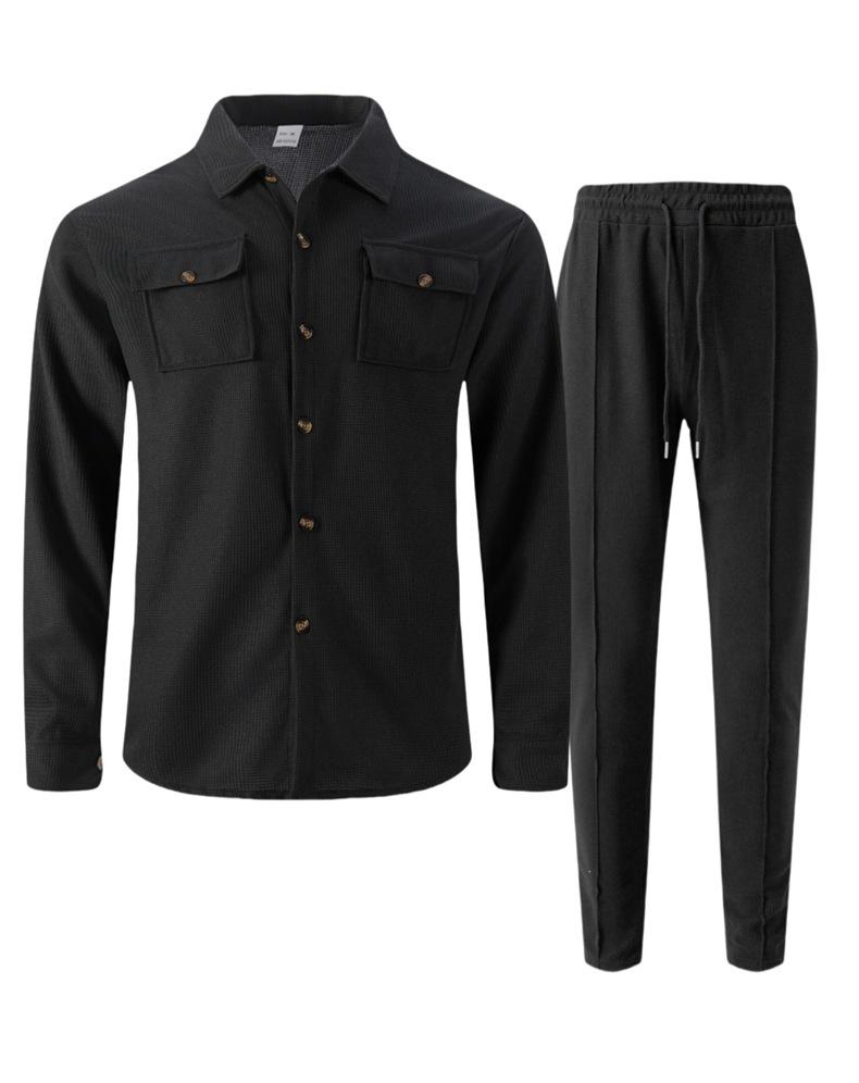 Completo casual da uomo autunnale europeo con giacca a maniche lunghe a nido d'ape e pantaloni