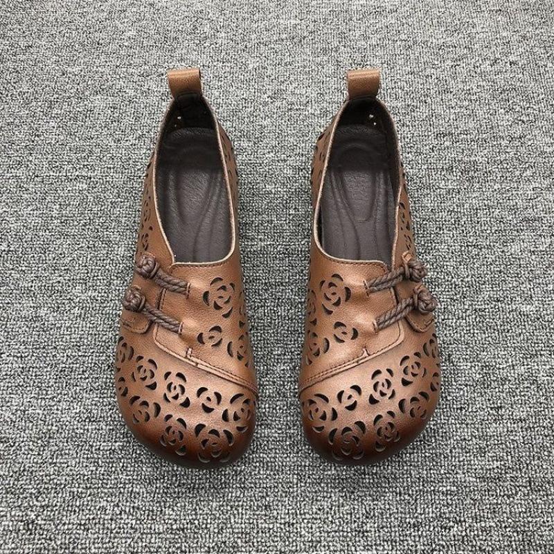 Sandals women's retro hollow breathable beef tendon sole non-slip hole shoes flat mother leather shoes