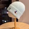 New cute puppy embroidered knitted hat for women, autumn and winter Korean version, versatile, warm, ear-protecting, face-slimming woolen hat