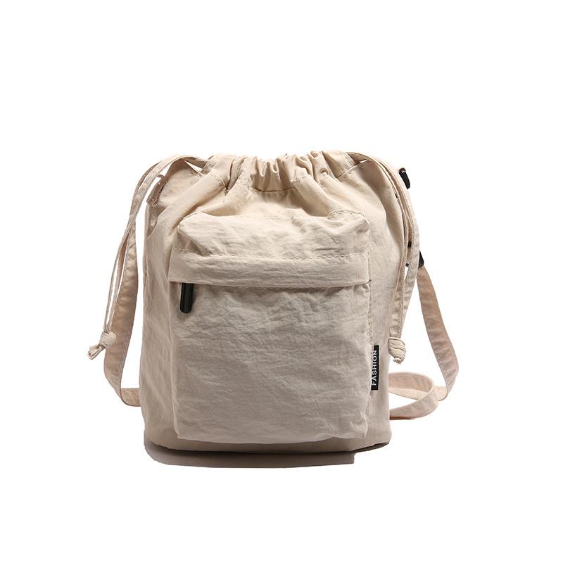 Nylon cloth bucket bag women s new casual simple shoulder bag versatile fashion lightweight tooling messenger bag белый