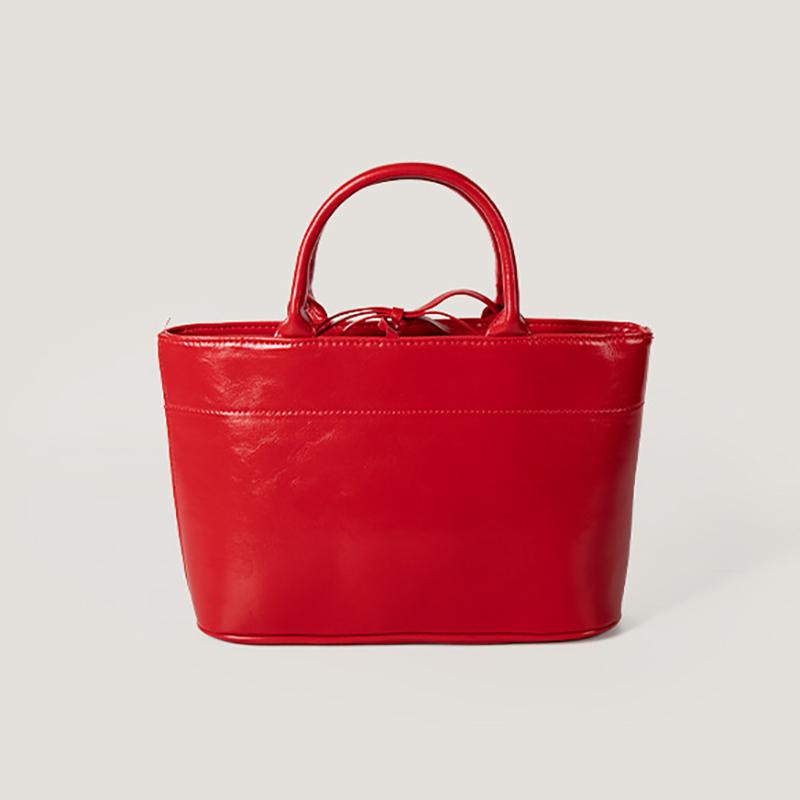 Textured PU leather travel bag for women large capacity red minimalist chic versatile leisure shopping travel