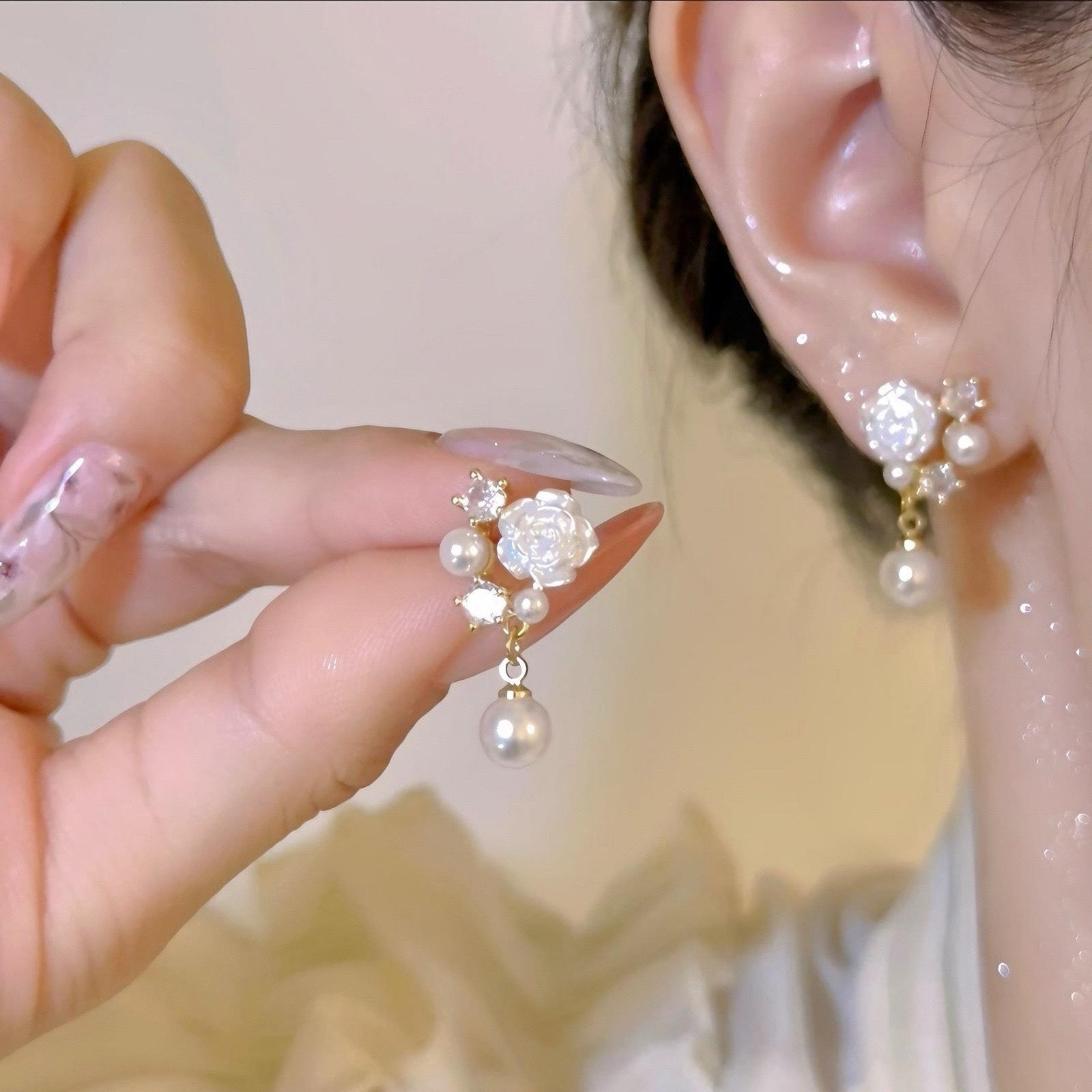 Pearl white camellia stud earrings, new high-end retro flower French small temperament earrings