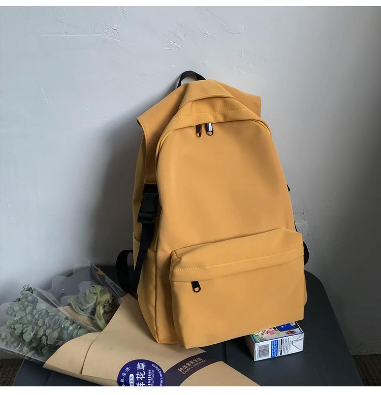 Japanese solid color fashion nylon backpack women s schoolbag women s Korean version high school light backpack women s college student backpack