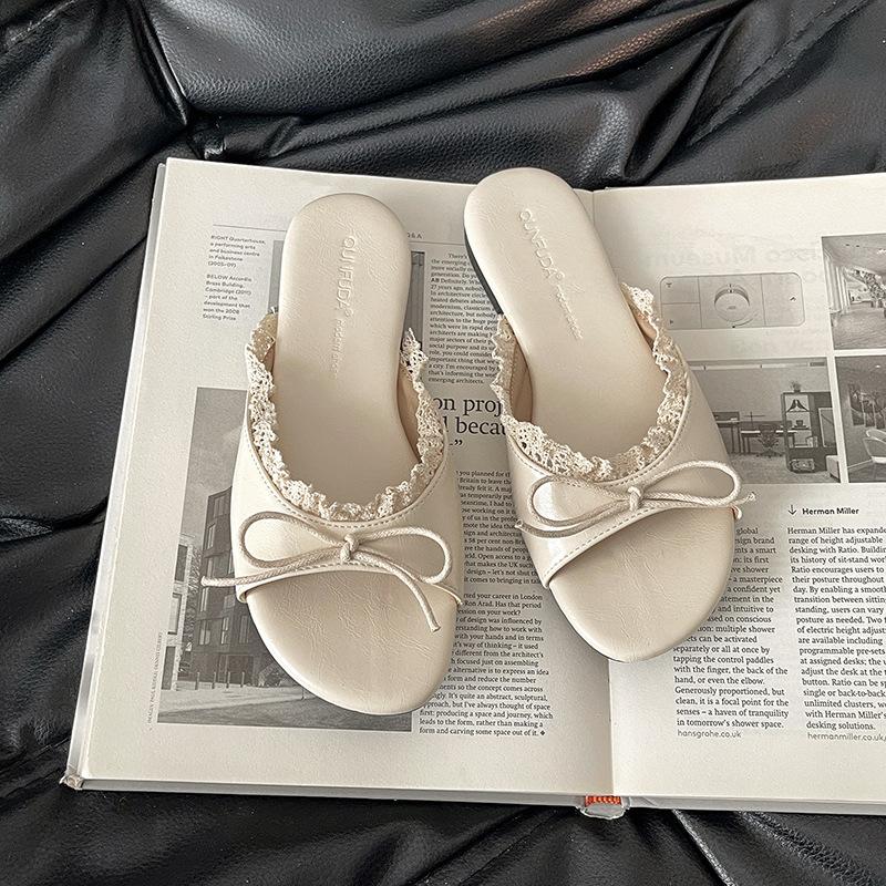 Flat-bottomed one-word tow shoes female French bow exquisite fairy style 2025 summer outer wear new non-slip cool slippers