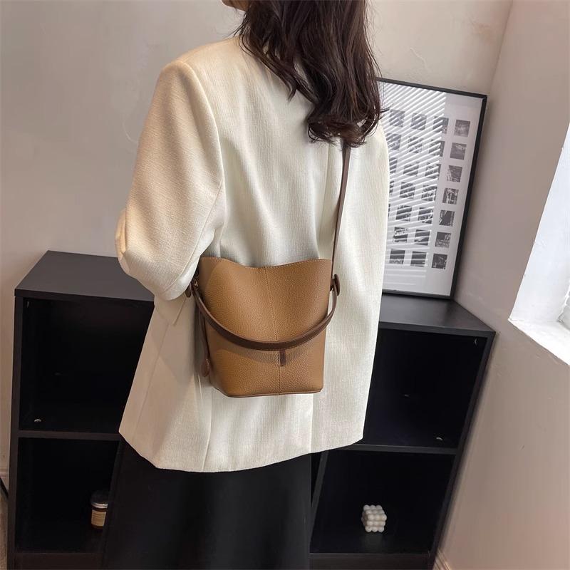 Advanced sense of foreign style small bag women's 2025 new niche portable vegetable basket bag fashion shoulder bucket messenger bag