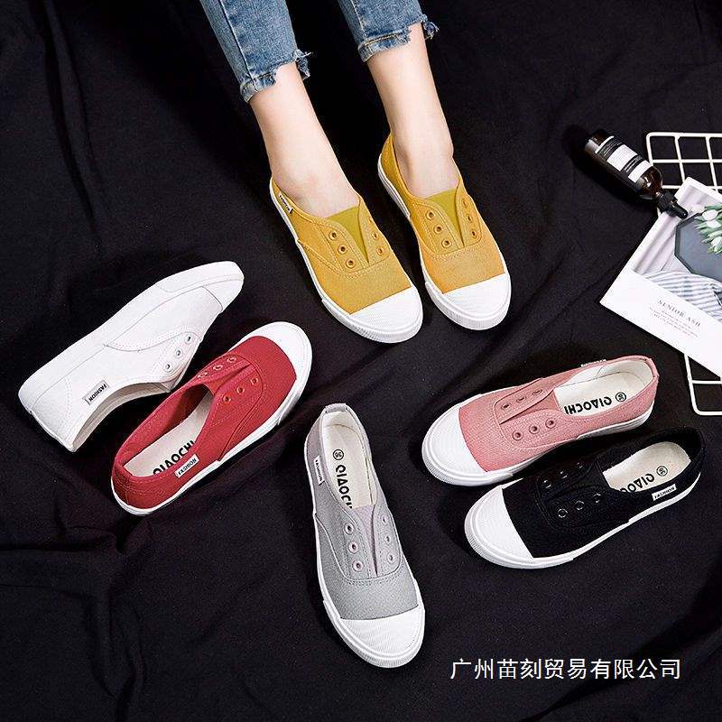 Segeltuchschuhe Frühling flach Ein-Pedal faule Schuhe Board Schuhe Trend
