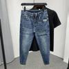 Jeans casual da uomo per primavera e autunno, design lavato ad acqua, vita media con leggera elasticità, pantaloni in denim