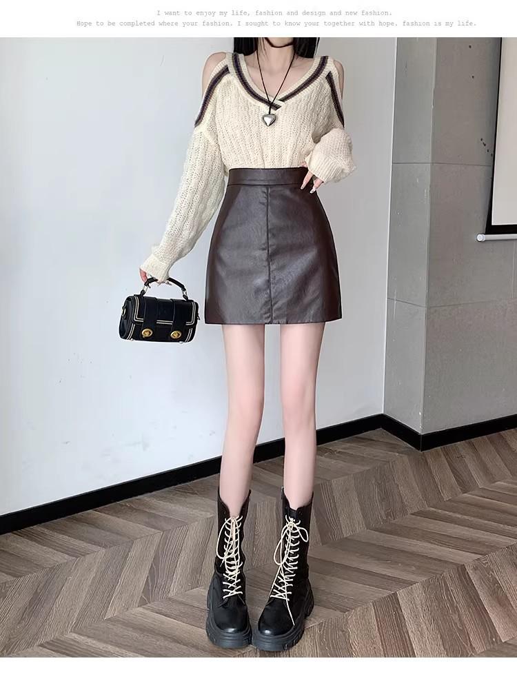 Damska Czarna Spódnica A-Line z Czarnej Skóry PU z Wysokim Stanem - Modelująca Sylwetkę, Podkreślająca Biodra, Krótka, Przeciwko Odkrywaniu, Idealna na Wiosnę i Jesień.