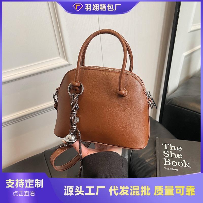 Niche light luxury portable shell bag women's new high-end retro fashion shoulder messenger bag