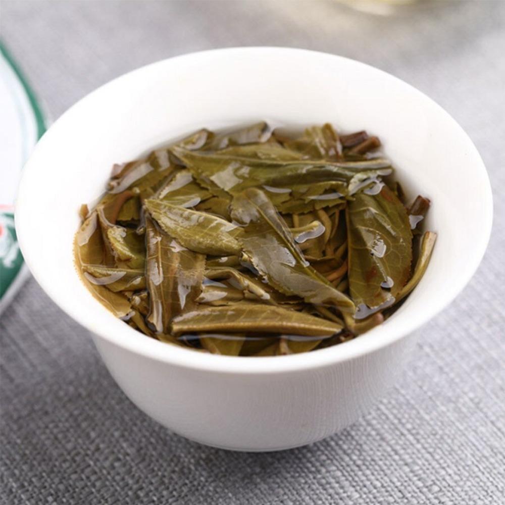 Haiwan 9948 Raw Pu-erh Tea Cake 357g Yunnan Old Comrade Lao Tong Zhi