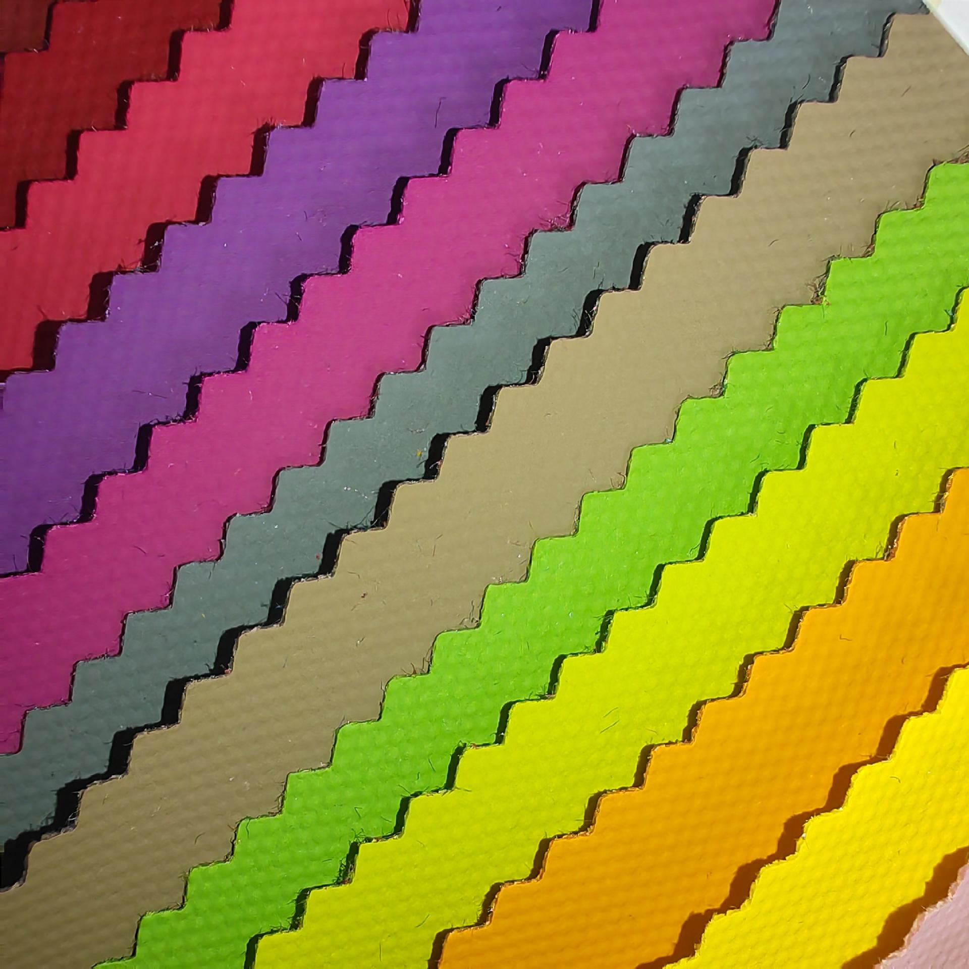 

In-Stock Eco-Friendly Outdoor Bag Fabric: 600D Oxford Cloth with Release Paper Film Glue for Luggage and Handbags.