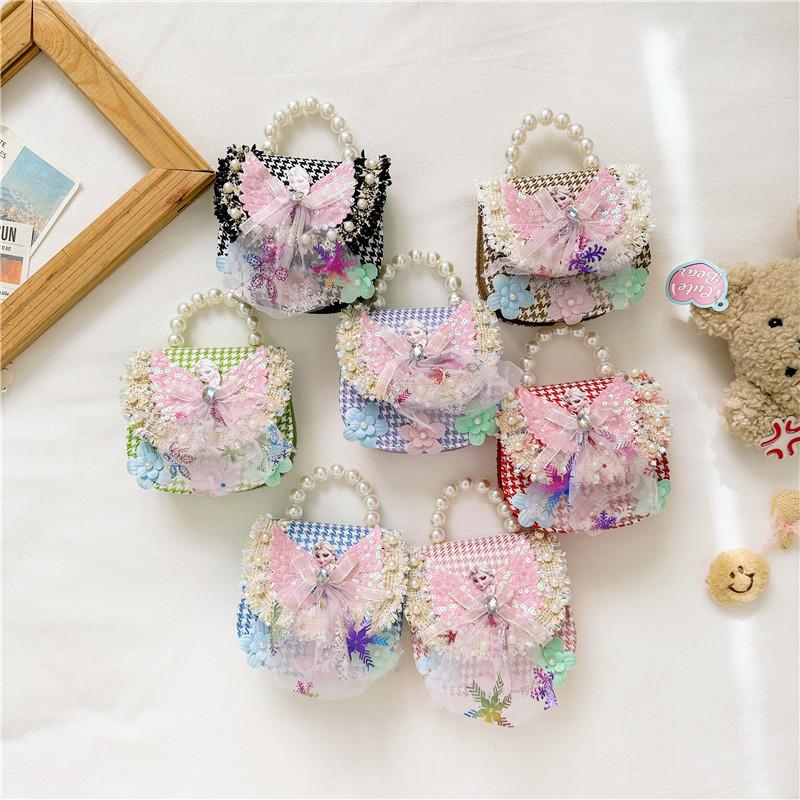 Stilvoller Prinzessinnen-Rucksack für Mädchen, verziert mit Perlen und Cartoon-Mustern in lebendigen Farben