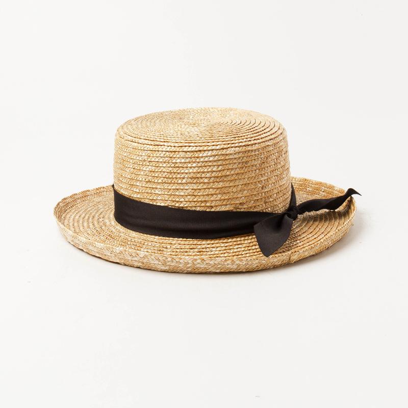 Spring and summer new bow decoration children's wide brim curled straw straw straw hat outdoor travel sun protection straw hat